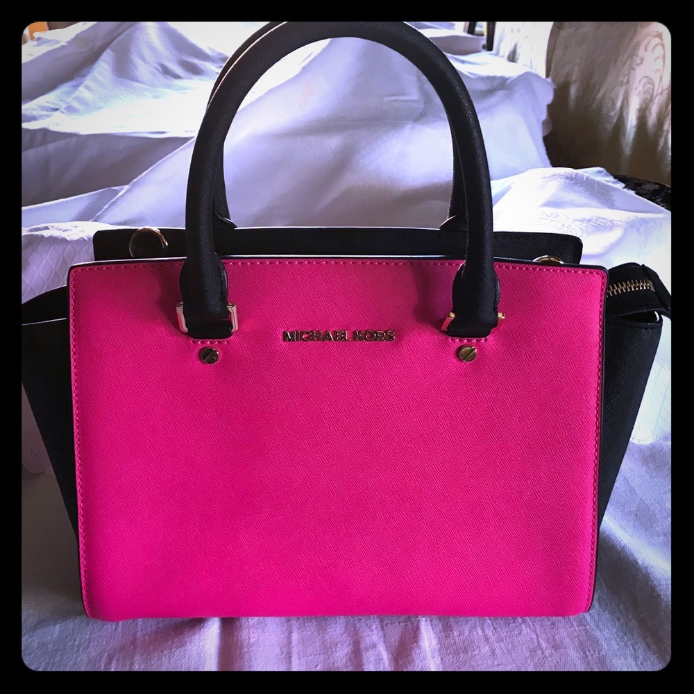 Michael Kors pink with black handbag